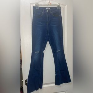 Dark blue bell bottom jeans